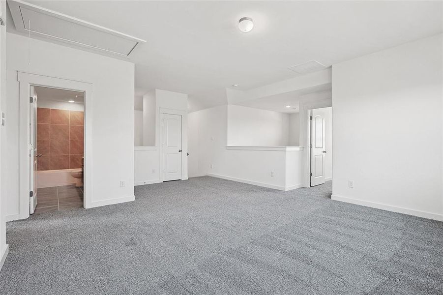 Empty room featuring carpet flooring