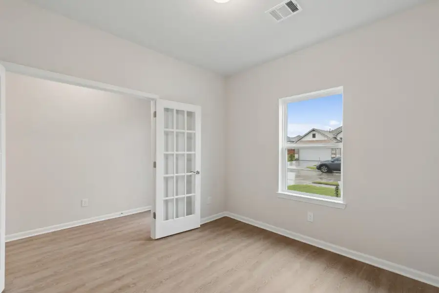 The Oakshire II- Study with French Doors.  Sample image for illustration; upgrades, options, and colors may vary.