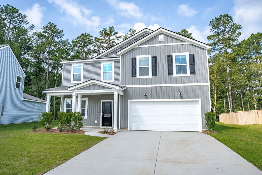 Front exterior of a new home in Bradford Pointe, Summerville, SC, highlighting curb appeal (Image 18).