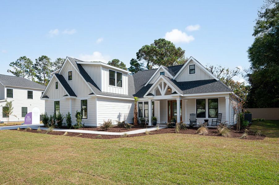 Front exterior of a new home in , Meggett, SC, highlighting curb appeal (Image 1). Front exterior of a new home in , Meggett, SC, highlighting curb appeal (Image 1).