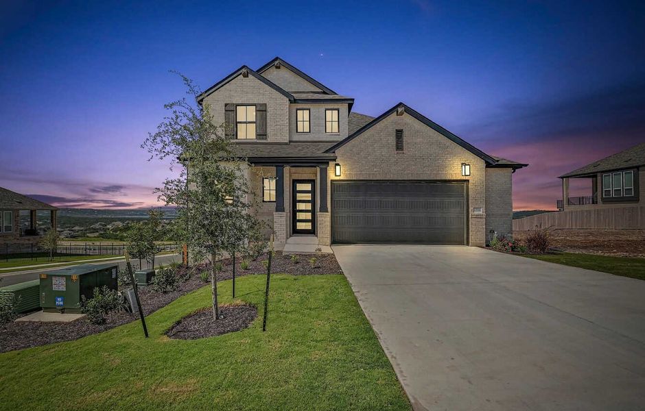 Front exterior of a home in the Lakeside at Tessera on Lake Travis community, located in Lago Vista, TX (Image 4).