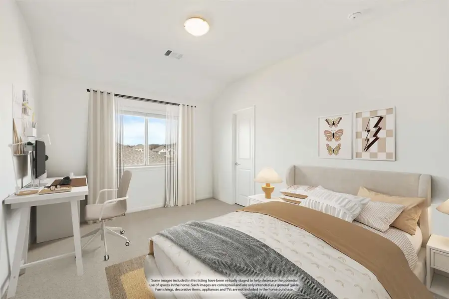 Bedroom with vaulted ceiling, carpet flooring, a desk workspace, and a queen bed with neutral bedding.
