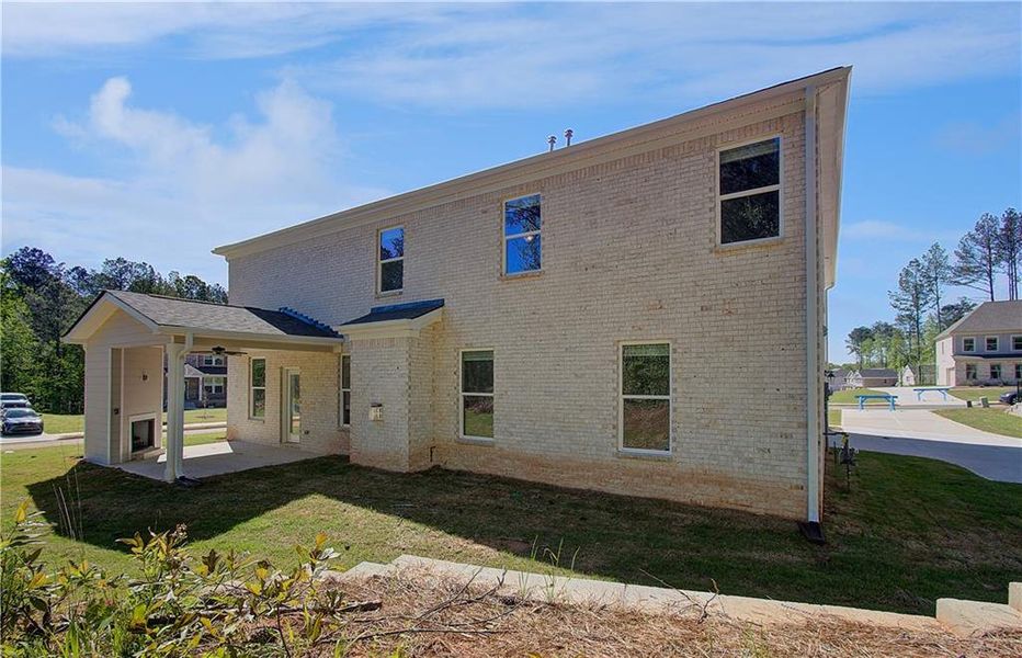 Exterior details and patio area of a home in Northcroft, Loganville (Image 23).
