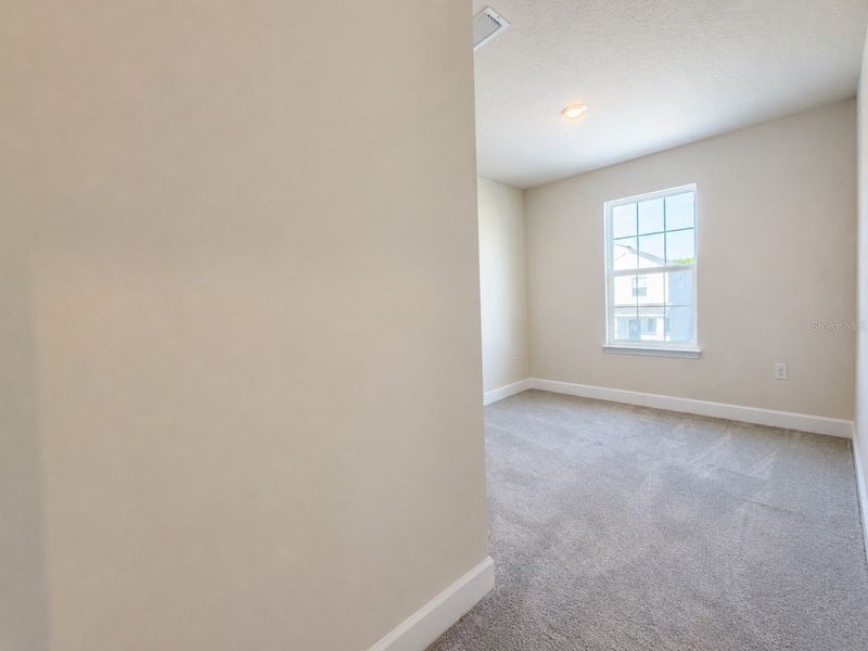 Spacious, unfurnished interior of a new home in Harmony Central, Harmony (Image 14).
