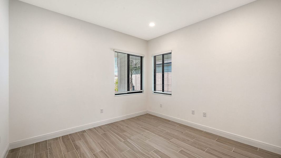 Spacious, unfurnished interior of a new home in Palm Grove Real Estate and Homes for Sale in Lakewood Ranch, FL - Neal Communities, Bradenton (Image 23).