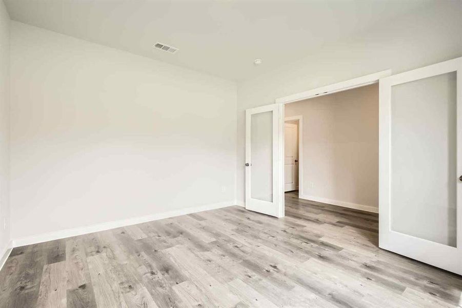 Spacious, unfurnished interior of a new home in Prestige Collection at Overland Grove, Forney (Image 18).