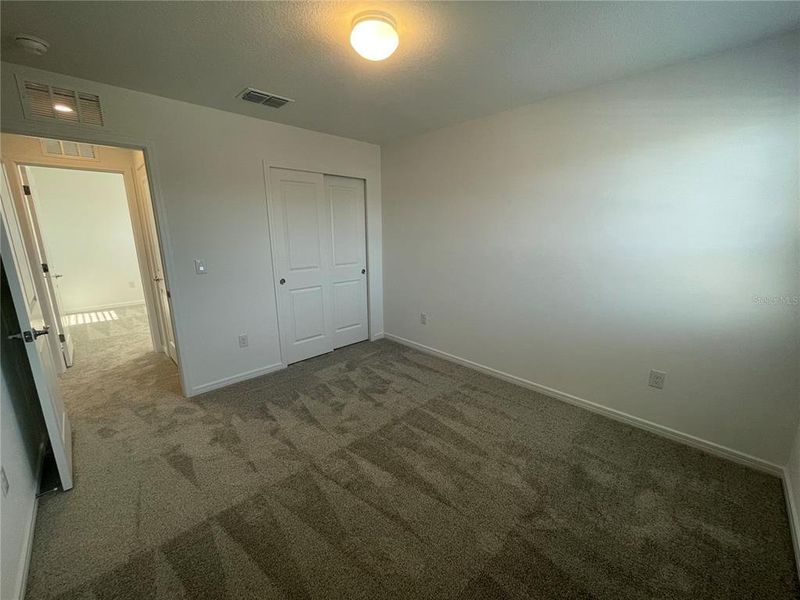 Spacious, unfurnished interior of a new home in Isles at BayView, Parrish (Image 10).