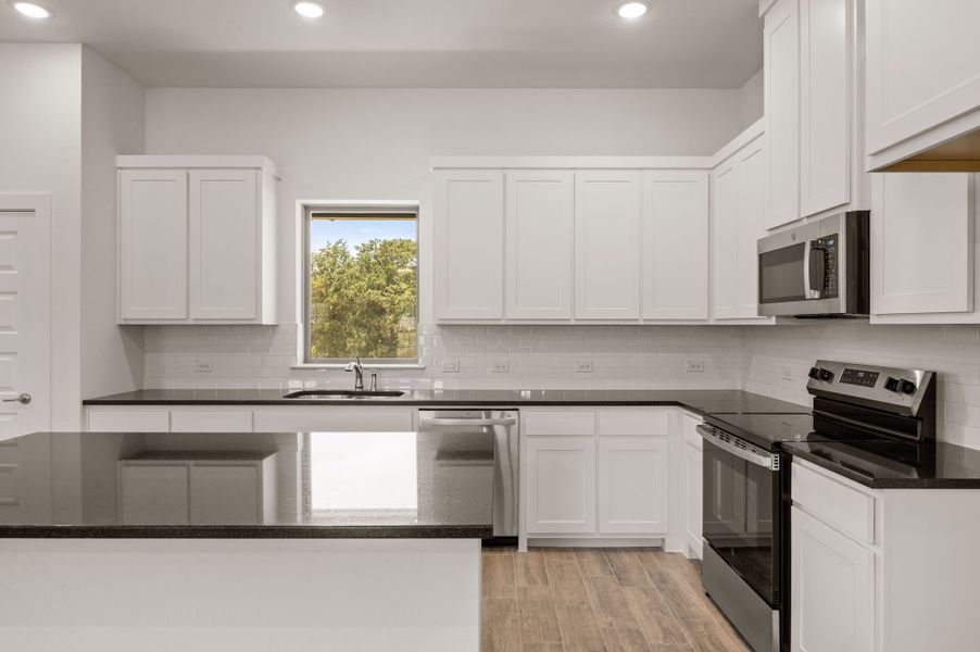 Furnished interior view inside a new home in Saddleback Estates, Boyd (Image 8).