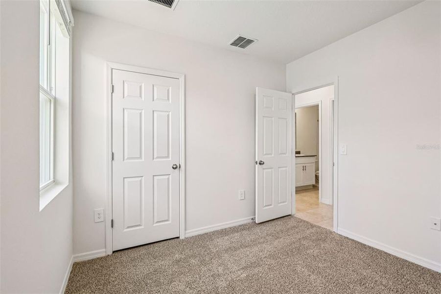 Spacious, unfurnished interior of a new home in Lake Deer Estates - Classic Series, Poinciana (Image 16).