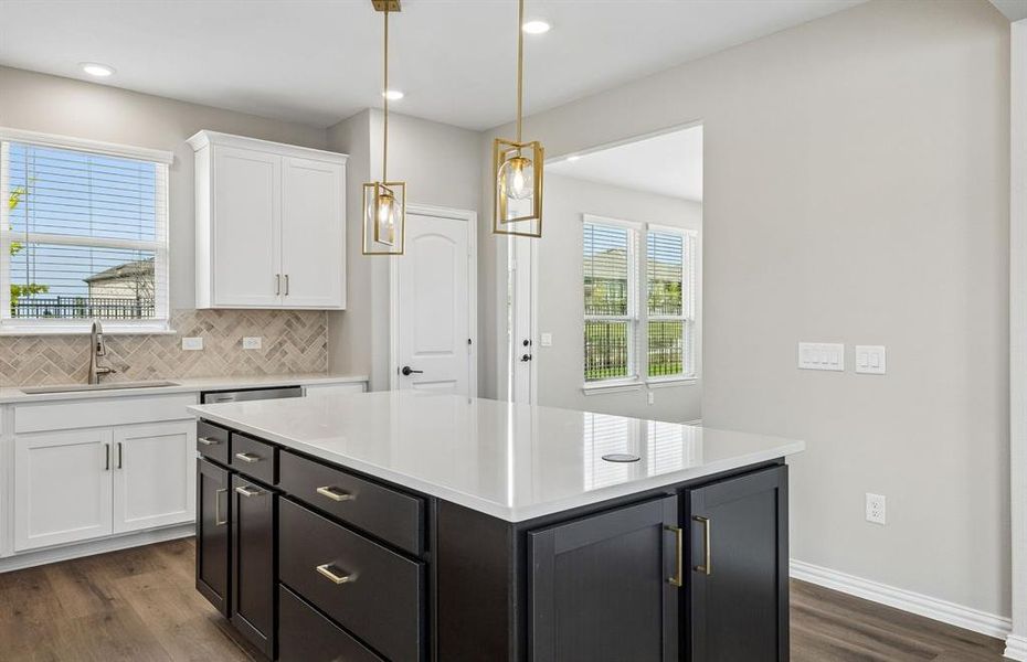 Kitchen with eat in bar top island