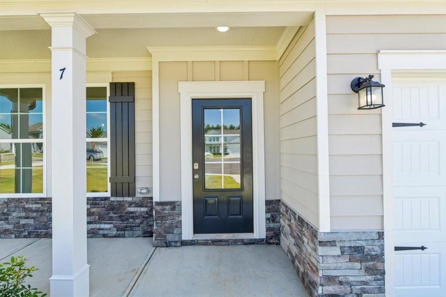 Exterior details and patio area of a home in Sutton’s Landing, Statham (Image 3).