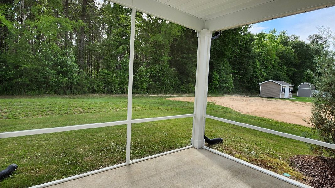 Exterior details and patio area of a home in Lexington Woods South, Fayetteville (Image 3).