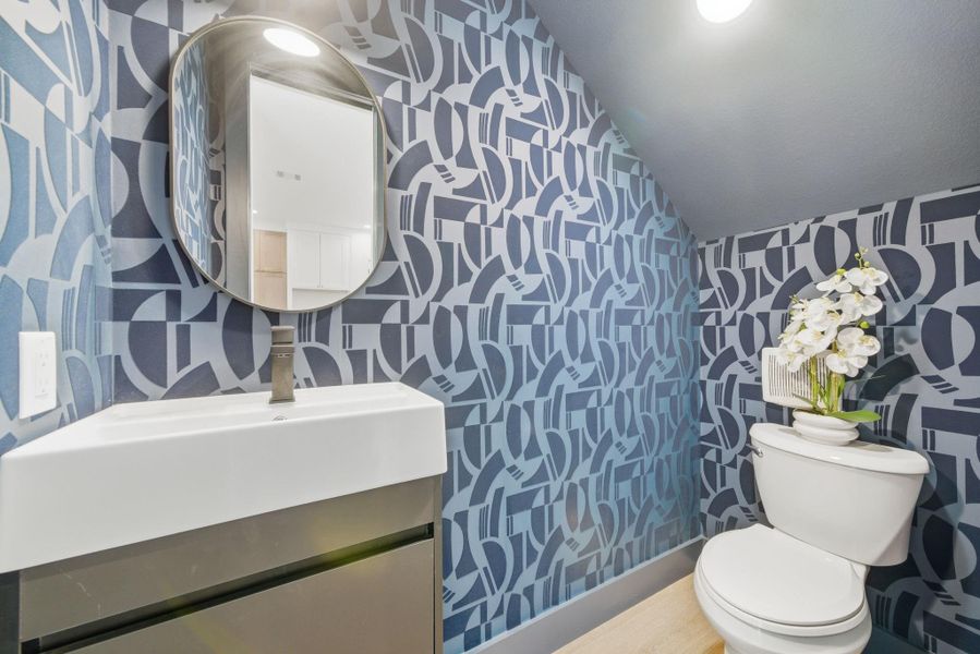 The beautiful half-bath offers a sleek and modern design. The beautiful half-bath offers a sleek and modern design.