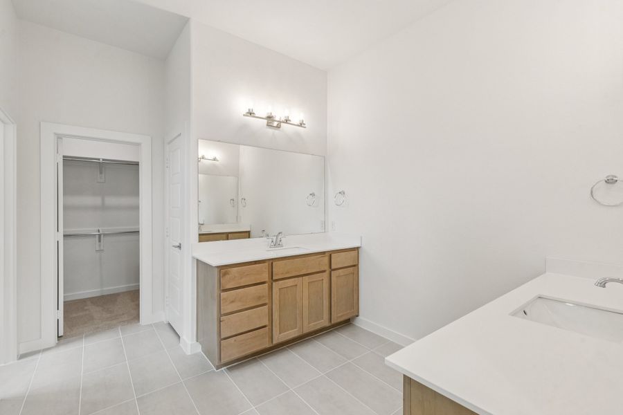 Primary Bathroom in the Da Vinci II home plan by Trophy Signature Homes – REPRESENTATIVE PHOTO