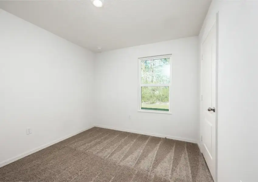 Representative unfurnished interior of a home built from the Hammock by LGI Homes in Marion Oaks, Ocala (Image 21).