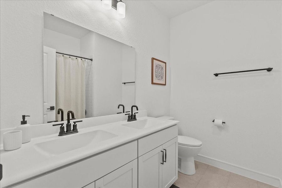 Upstairs full bath with double sinks!