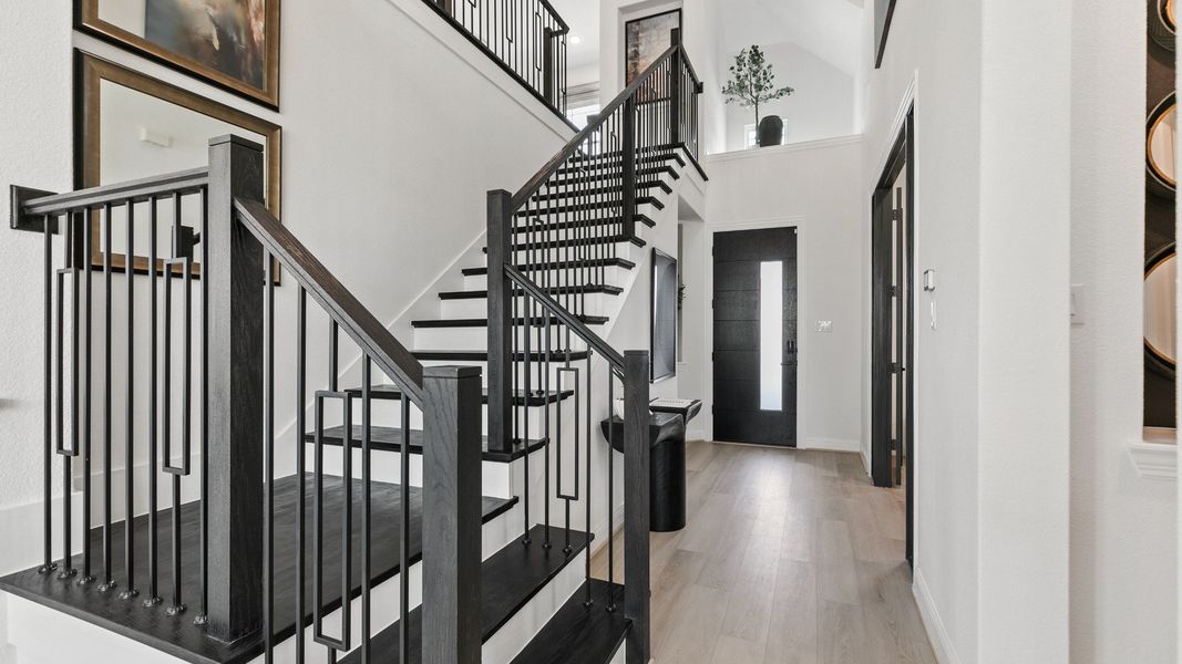 Representative furnished interior of a home built from the Mimosa by Brightland Homes in Sunterra, Katy (Image 6).