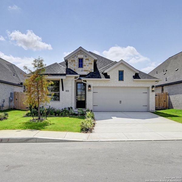 Front exterior of a new home in Kallison Ranch 45', San Antonio, TX, highlighting curb appeal (Image 19).