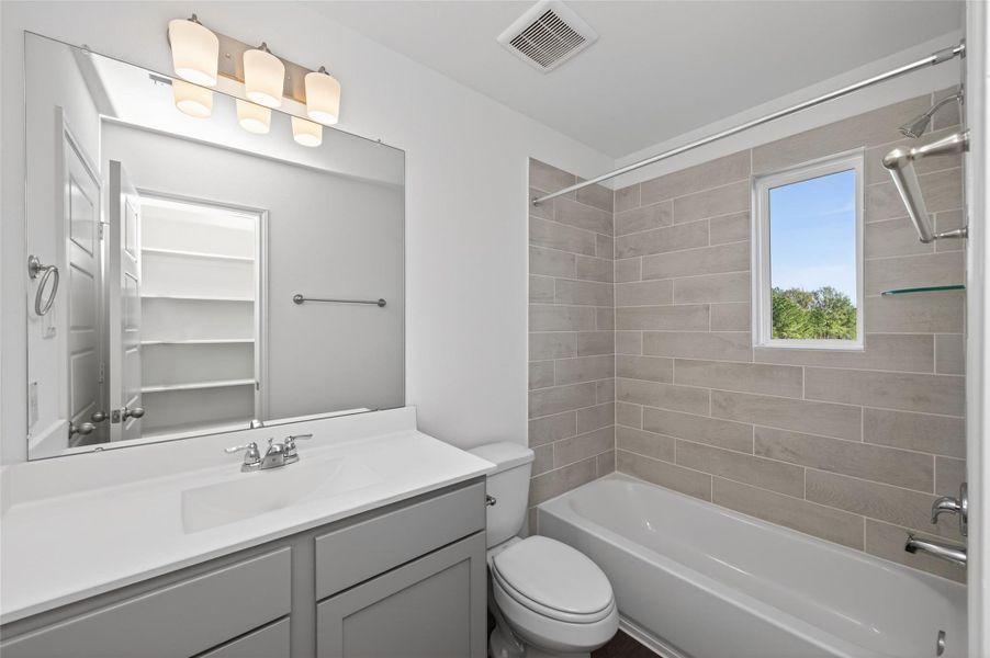 Furnished interior view inside a new home in Enclave at Willis, Willis (Image 13).