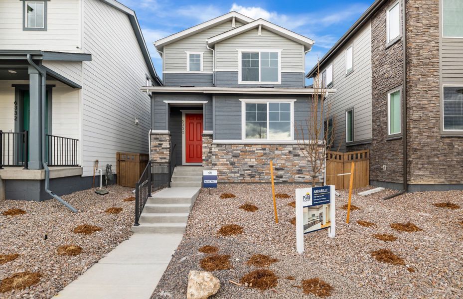 Front exterior of a home in the Painted Prairie community, located in Aurora, CO (Image 17).