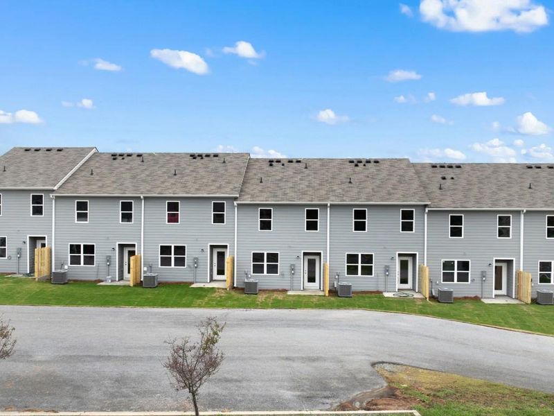 Front exterior of a new home in Shorter Village, Rome, GA, highlighting curb appeal (Image 2).