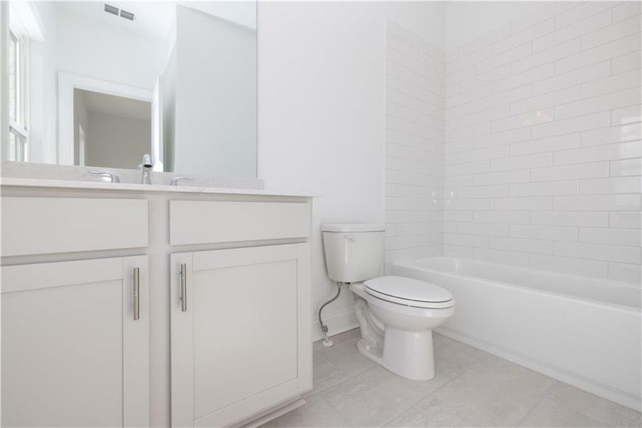Furnished interior view inside a new home in Millcroft Townhomes, Buford (Image 8). Furnished interior view inside a new home in Millcroft Townhomes, Buford (Image 8).