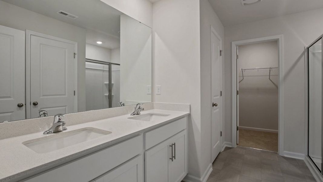Furnished interior view inside a new home in The Grove at Matthews Landing, Fuquay Varina (Image 8).