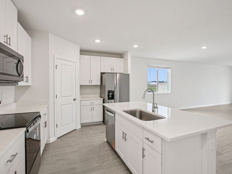 Furnished interior view inside a new home in Two Rivers - Classic Series, Zephyrhills (Image 5).
