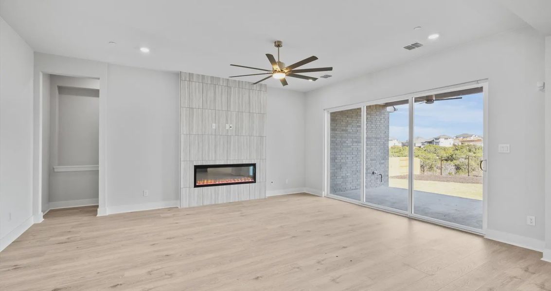 Representative unfurnished interior of a home built from the Raegan by Chesmar Homes in Sweetwater, Austin (Image 8).