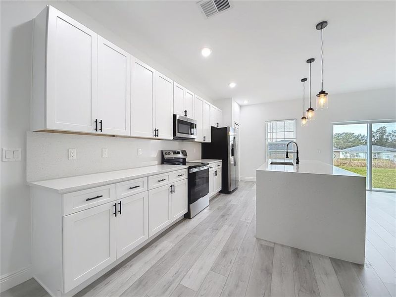 Furnished interior view inside a new home in , Ocala (Image 9).