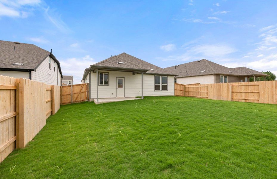 Front exterior of a new home in Patterson Ranch, Georgetown, TX, highlighting curb appeal (Image 1). Front exterior of a new home in Patterson Ranch, Georgetown, TX, highlighting curb appeal (Image 1).