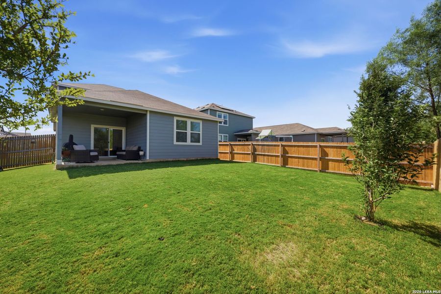 Exterior details and patio area of a home in Millican Grove, Converse (Image 3).