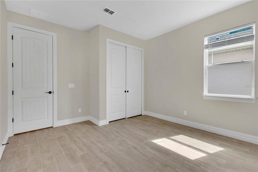 Spacious, unfurnished interior of a new home in Amelia Groves, St. Cloud (Image 20).