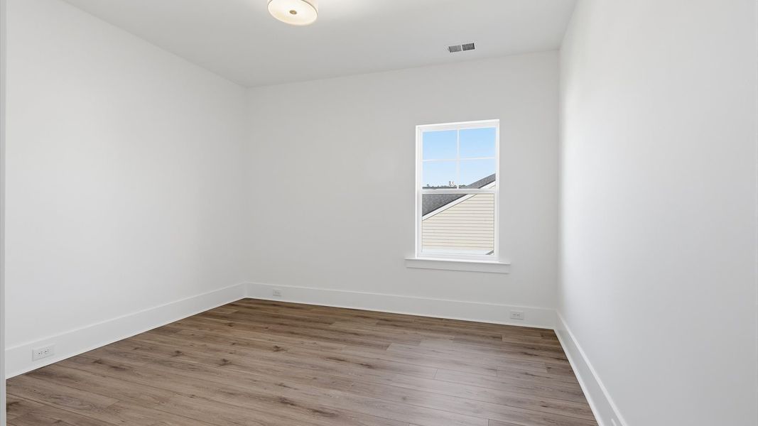 Representative furnished interior of a home built from the Eden by DRB Elevate. in Summerwind Crossing at Lakes of Cane Bay, Summerville (Image 32).