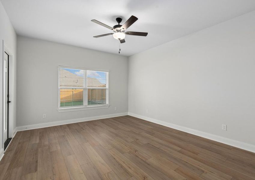 Spacious master bedroom large enough to fit all of your king-size furniture.