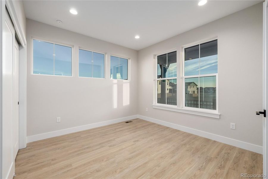 Spacious, unfurnished interior of a new home in West Grange, Longmont (Image 46).