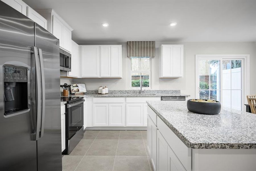 Furnished interior view inside a new home in Seminole Palms Townhomes, Palm Coast (Image 2).