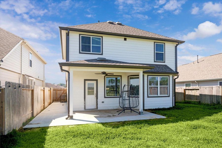 Front exterior of a new home in Granger Pines, Conroe, TX, highlighting curb appeal (Image 2).