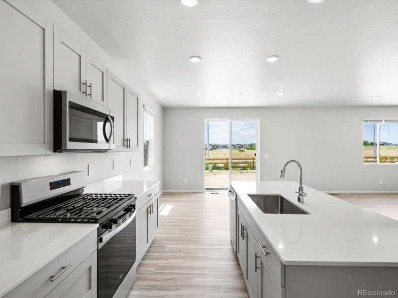 Furnished interior view inside a new home in Ridgeline Vista: The Canyon Collection, Brighton (Image 4).