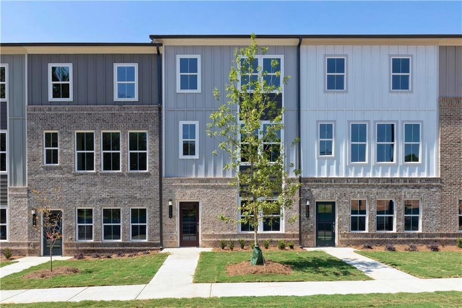 Front exterior of a new home in , Lawrenceville, GA, highlighting curb appeal (Image 1).