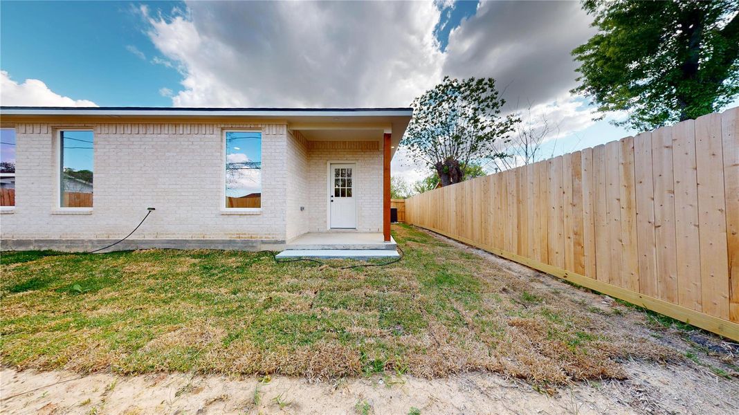 Exterior details and patio area of a home in , Houston (Image 3).