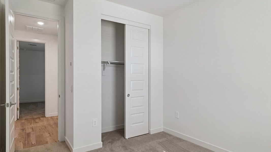 Representative unfurnished interior of a home built from the Hayden by D.R. Horton in The Ridge at Stone Butte, Phoenix (Image 18).