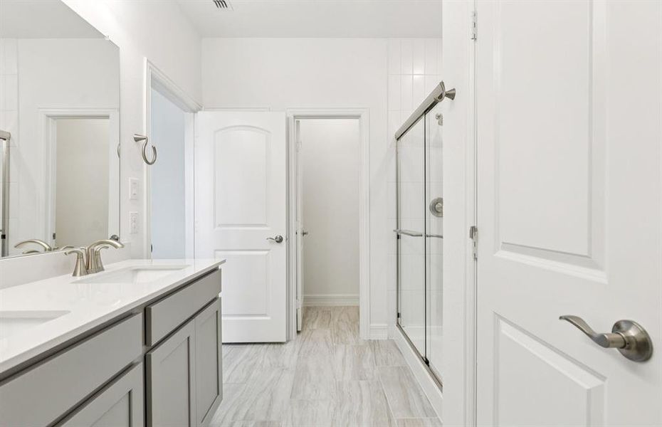 Owner's private bath with double vanity
