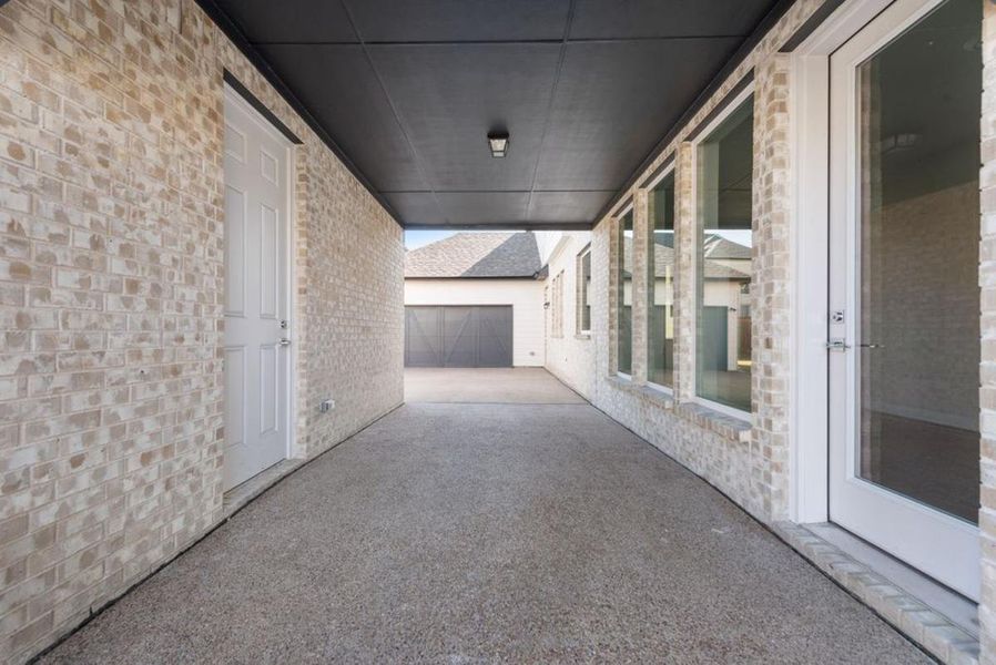Exterior details and patio area of a home in South Pointe, Mansfield (Image 29).
