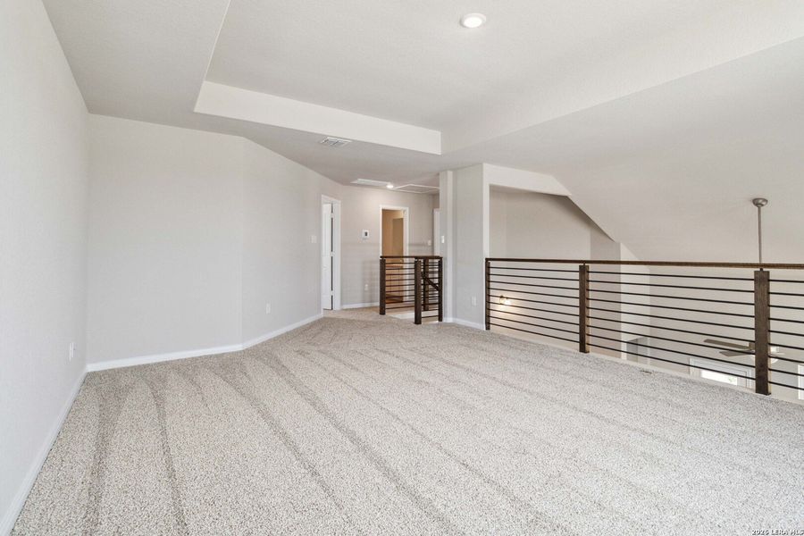 Spacious, unfurnished interior of a new home in Hunters Ranch, San Antonio (Image 12).