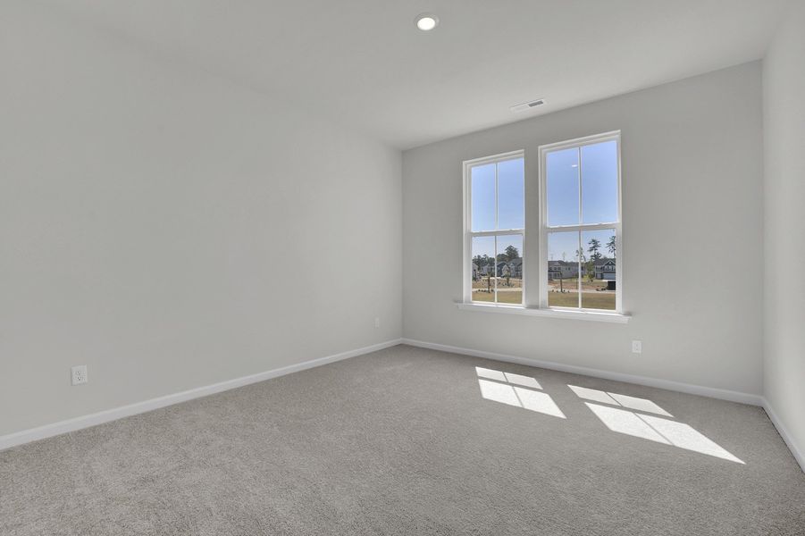 Spacious, unfurnished interior of a new home in Grand Park, Leland (Image 24).