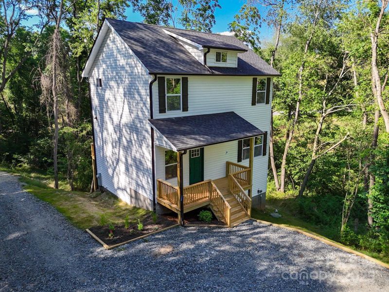 Front exterior of a new home in , Waynesville, NC, highlighting curb appeal (Image 19). Front exterior of a new home in , Waynesville, NC, highlighting curb appeal (Image 19).