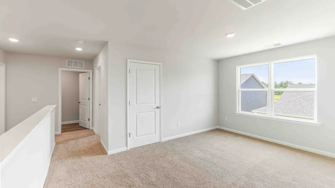 Representative unfurnished interior of a home built from the Hayden by D.R. Horton in Brookside, Richlands (Image 31).
