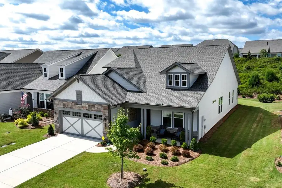 Front exterior of a new home in , Hoschton, GA, highlighting curb appeal (Image 2). Front exterior of a new home in , Hoschton, GA, highlighting curb appeal (Image 2).