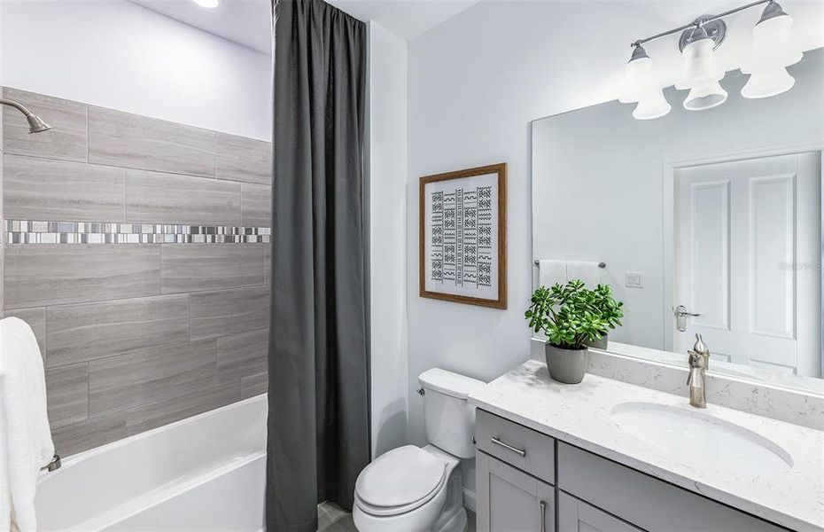 Furnished interior view inside a new home in BeachWalk by Manasota Key, Englewood (Image 7).